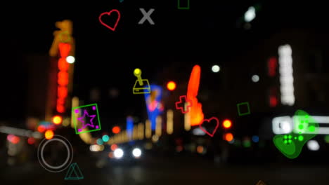 animación de iconos de juegos de neón sobre el paisaje urbano nocturno