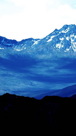 majestic mountains under a clear sky showcase natures grandeur