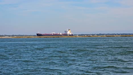 Tanker-ship-slowly-moving-thru-a-Cooper-River,-Charleston-south-carolina