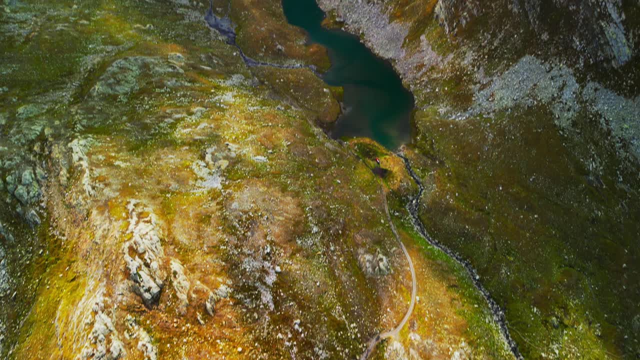 Mountain lake Naret in Switzerland nestled between mountains