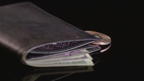 bitcoin and us dollars in a wallet