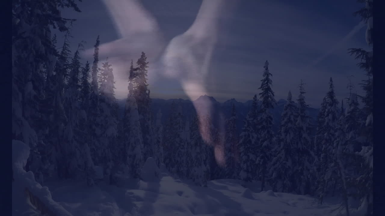 Hovering translucent hands over snowy forest at dusk, creating animation effect