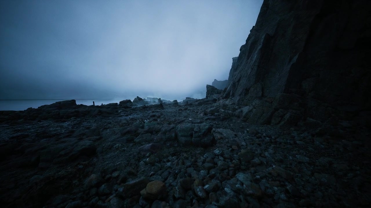 Atmospheric image capturing lofty cliffs and serene ocean under dusky blue sky