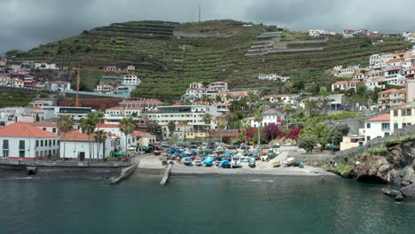 aerial shot of câmara de lobos bay fisherman village in madeira, portugal