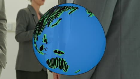 animation of globe over businessman handshake