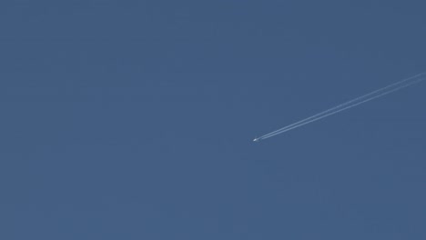 aeroplane clear blue sky contrail vapor trails australia, victoria, gippsland, maffra daytime wide shot