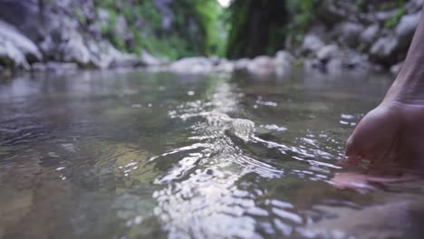 The-entry-of-the-hand-into-the-water.