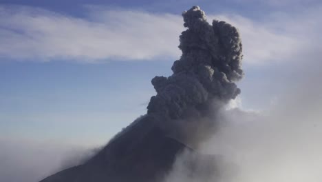 Volcano-emitting-thick-gray-smoke