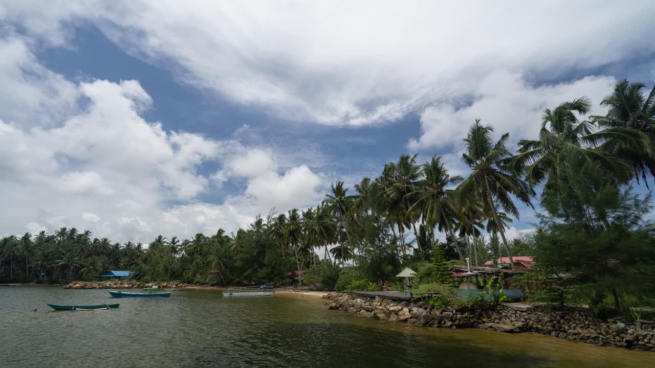 Tropical Bay with Palm Trees, Boats, and Cloudy Sky