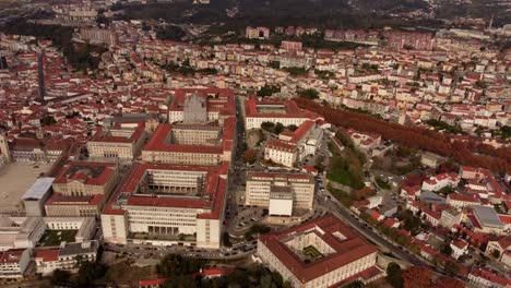 Aerial-view-of-coimbra-city-center-big-university-in-portugal-drone-fly-above-old-ancient-medieval-town