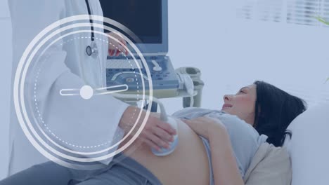 Fast-moving-hands-on-clock-over-caucasian-female-doctor-and-pregnant-patient-having-ultrasound-scan