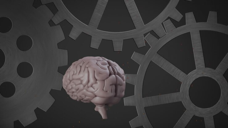 Animation of spinning human brain over turning metallic cogs on grey background