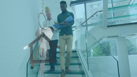 animation of silver house key and key fob over diverse businesspeople
