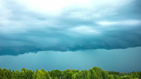 a cloudscape moving horizontally on a windy weather and moving the trees