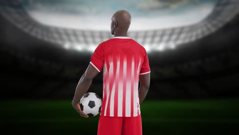 animation of stadium over african american male soccer player