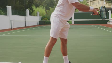 tennis player doing a service