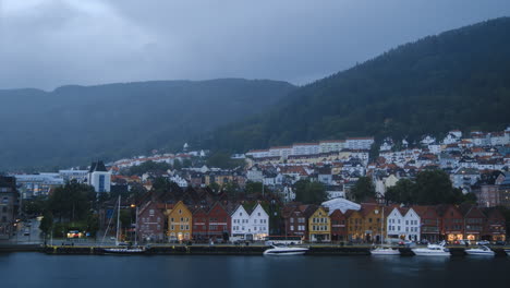 evening timelapse of bergen, bryggen in norway with heavy rain