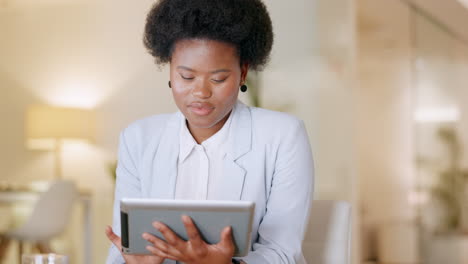 Business-woman-browsing-on-digital-tablet