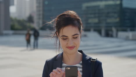 portrait-successful-young-business-woman-using-smartphone-professional-female-texting-browsing-messages-enjoying-mobile-phone-communication-in-city-slow-motion