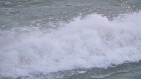 rearview of the water wave of a fast-moving boat propeller thrust a huge burst of water