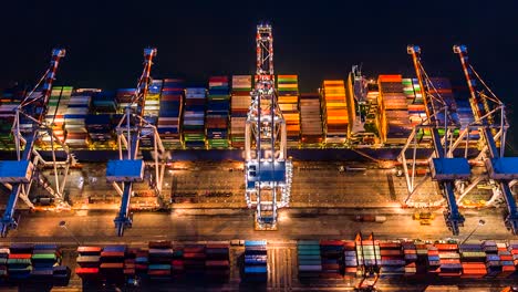 aerial view, 4k.time lapse industrial port with container port where is a part of shipping