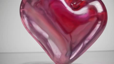corazón de vidrio rosado