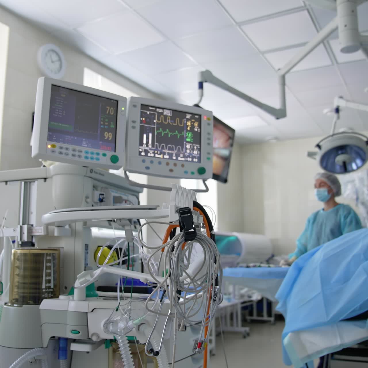 Contemporary medical system in the operating room. Monitor and machine ventilator in hospital theater. Modern equipment to show vital signs of a patient in the hospital