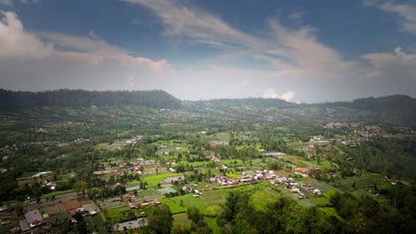 Beautiful-blue-white-sky-background,-Indonesian-farmland,-mountain-peak