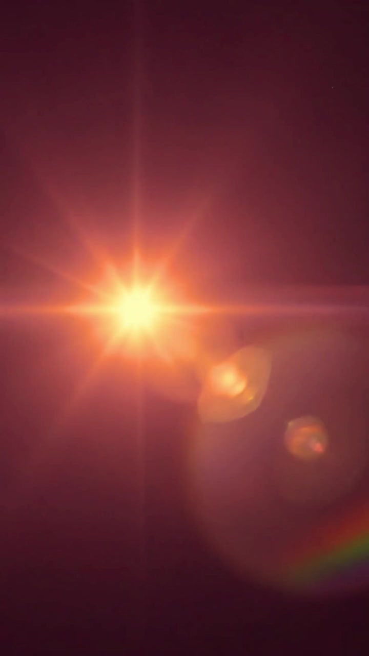 Effetto lens flare cinematografico con starburst e bokeh