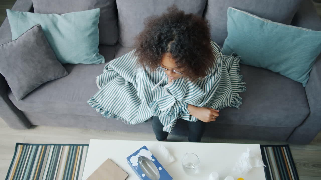 Woman feeling ill at home