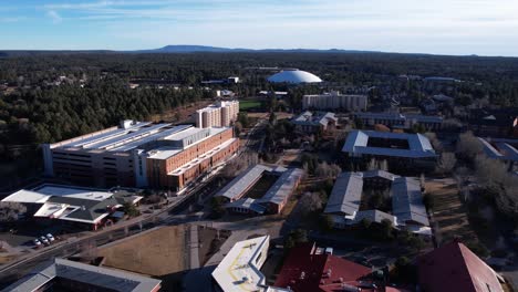 drone shot of northern arizona university campus buildings, flagstaff usa, dormitory buildings and halls