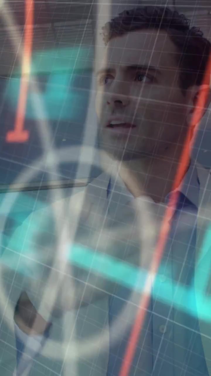 Vertical video: Male medic scanning holograms sweeping over stethoscope and chest, analyzing vitals