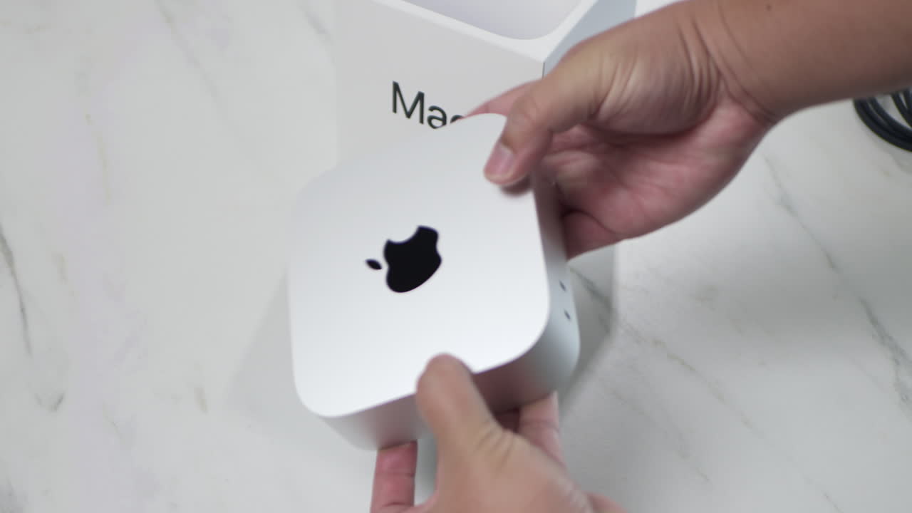 New Apple Mac Mini (2024). Latest Mac Mini model has been downsized to a 5-inch square, featuring the powerful M4 and M4 Pro Chip for integrated Apple Intelligence.