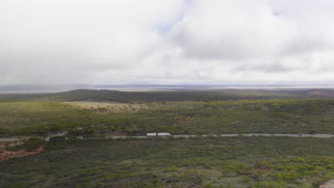 big semi truck driving through the australian outback