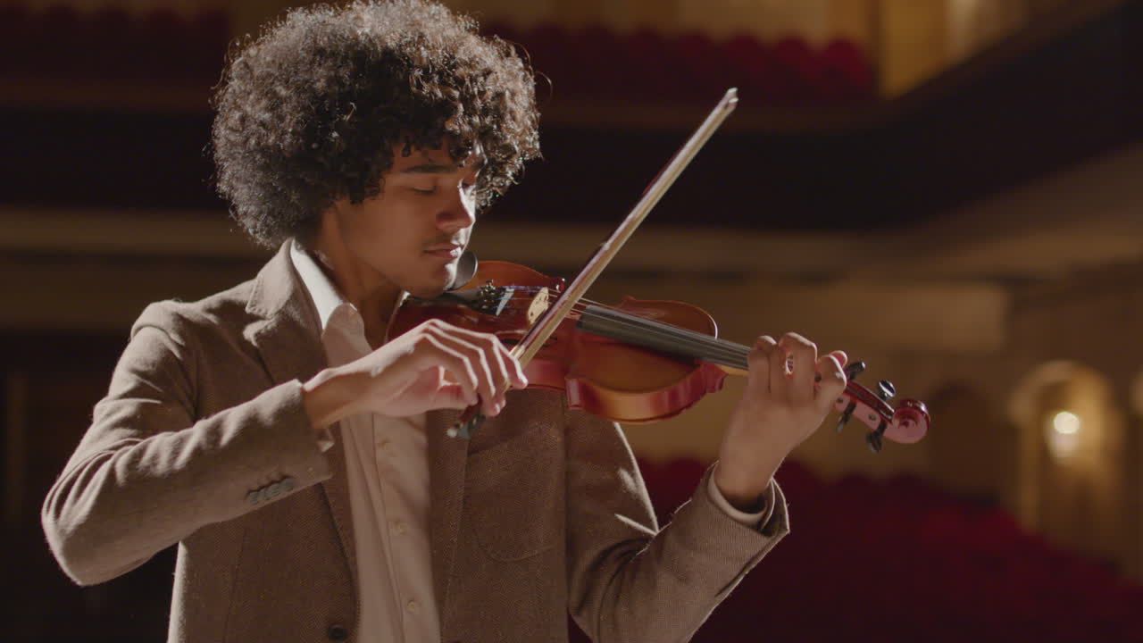 Young Musician Playing Violin with Accompanist