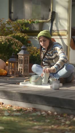 young woman relaxing outdoors in autumn