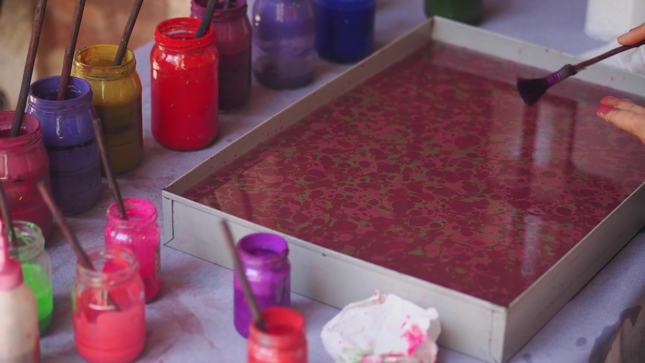 Artist Creating Traditional Ebru Paper Marbling Art