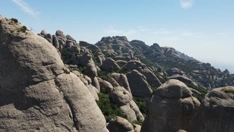 Aerial-views-of-Montserrat-peaks,-a-mountain-range-in-Catalonia