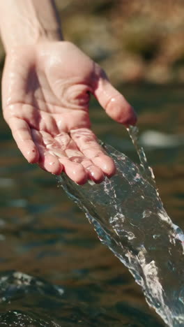 hand in a stream