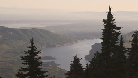 the view of lake cushman and hood canal from a peak in the olympic mountains at sunset