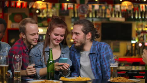 Young-joyful-people-taking-selfie-with-black-smartphone-snapping-pictures-for-sweet-memories-concept-of-everyday-life-with-gadgets.