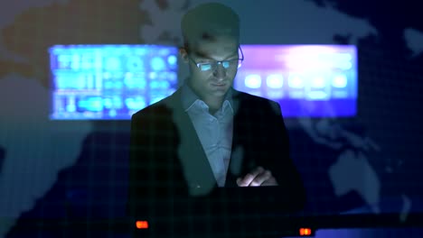 the man working with a tablet on the hologram background