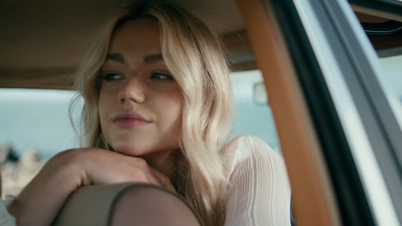 Woman in Vintage Car