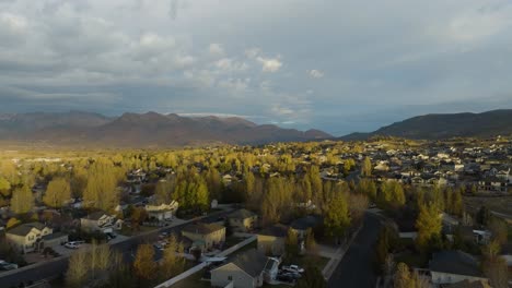 heber, utah at sunrise: town, mountains, and picturesque valley - aerial reveal