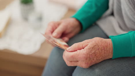 Senior-woman,-hands-and-photograph-of-memory