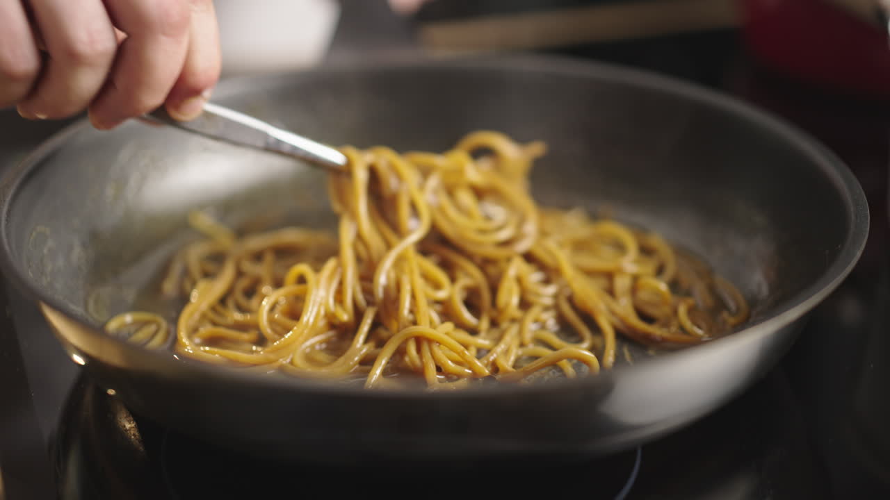 Cooking noodles in a pan
