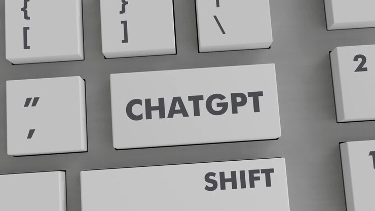 pulsando el botón chatgpt en el teclado