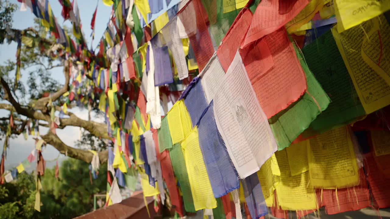 Prayer Flags at Monkey Temple in Kathmandu in Nepal, Bright Colourful Buddhist Prayer Flags of Bright Colorful Colors at the Sacred Holy Religious Site for Buddhism