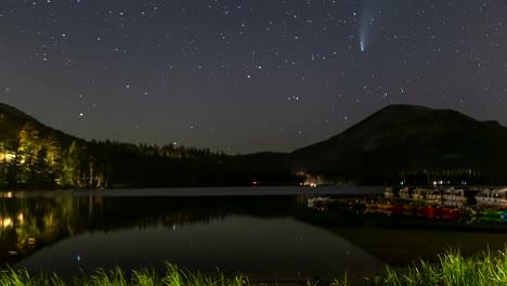 comet neowise passes over lake mary at night in mammoth lakes california, usa