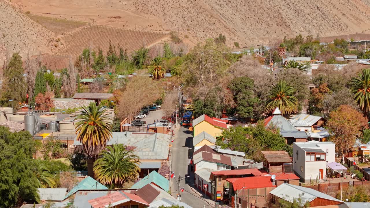 Explore Pisco Elqui with scenic mountains, vineyards, clear skies, and renowned pisco production